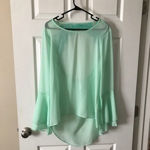 Beautiful mint green blouse.